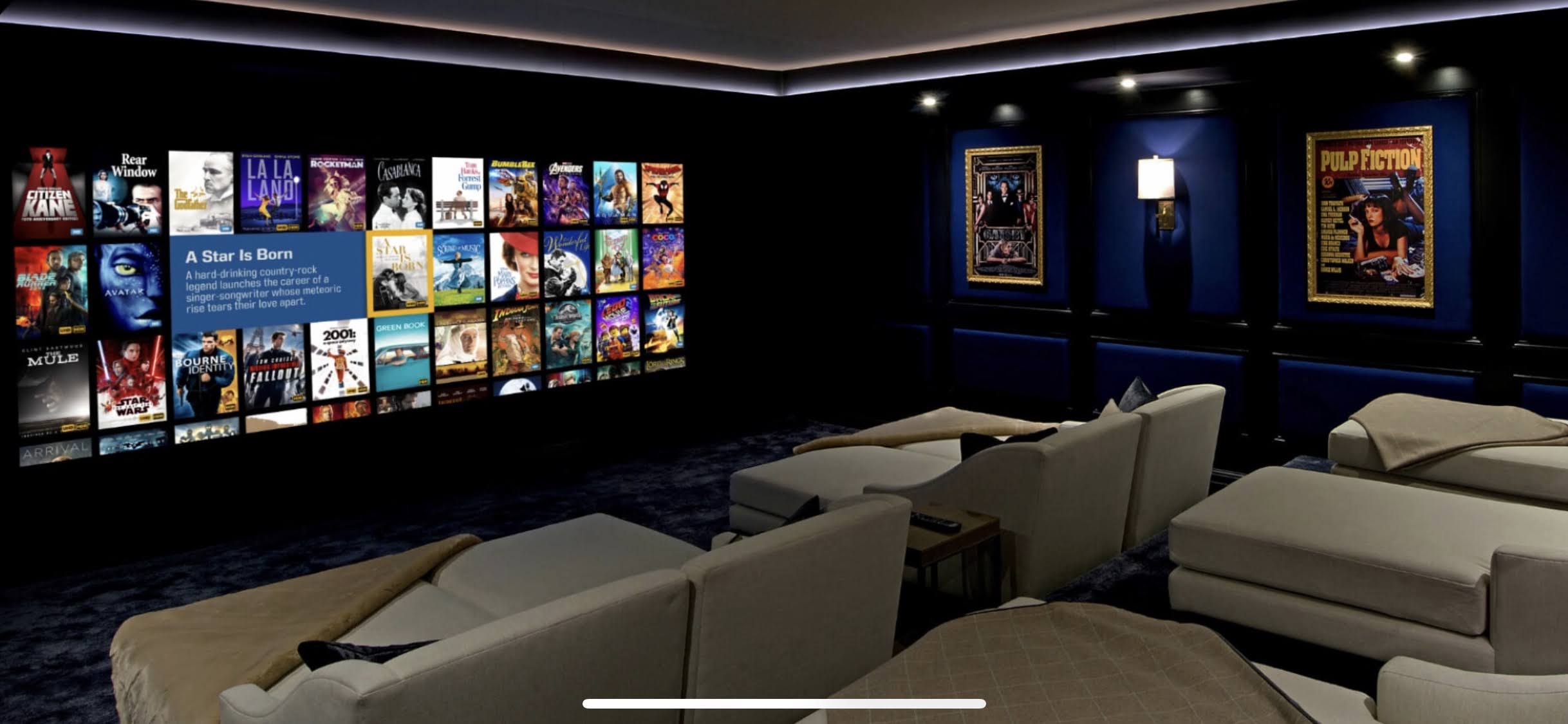Modern home theater with movie posters on the wall and comfortable seating.